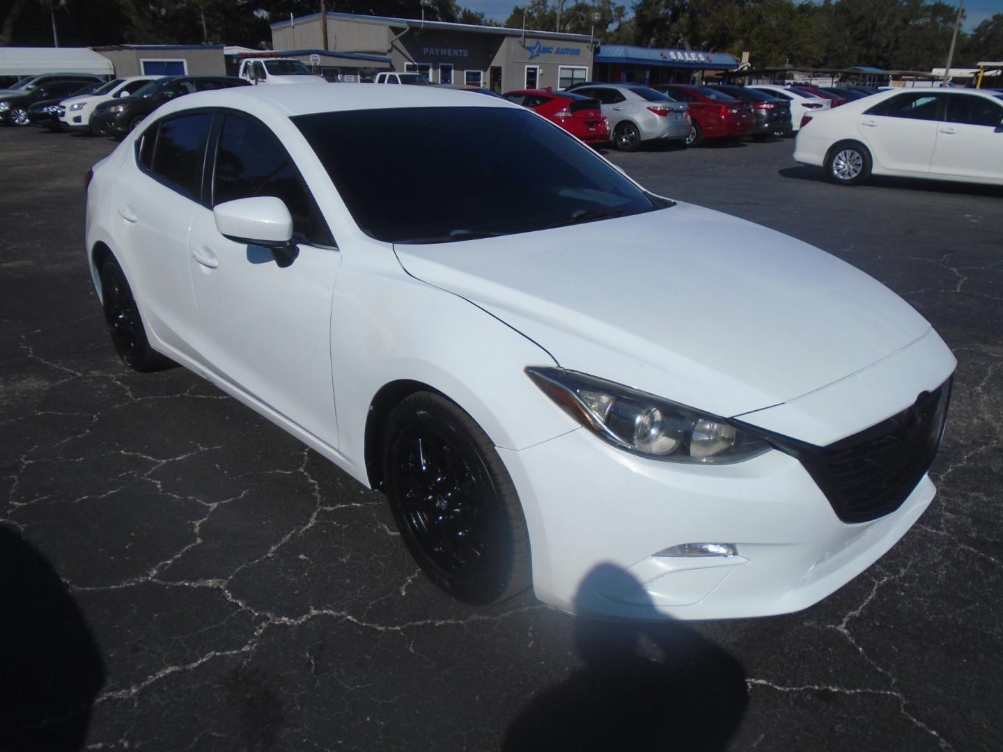 2014 Mazda MAZDA3 (JM1BM1V72E1) , located at 6112 N Florida Avenue, Tampa, FL, 33604, (888) 521-5131, 27.954929, -82.459534 - Photo#2